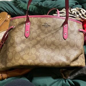 Pink and tan coach bag and wallet